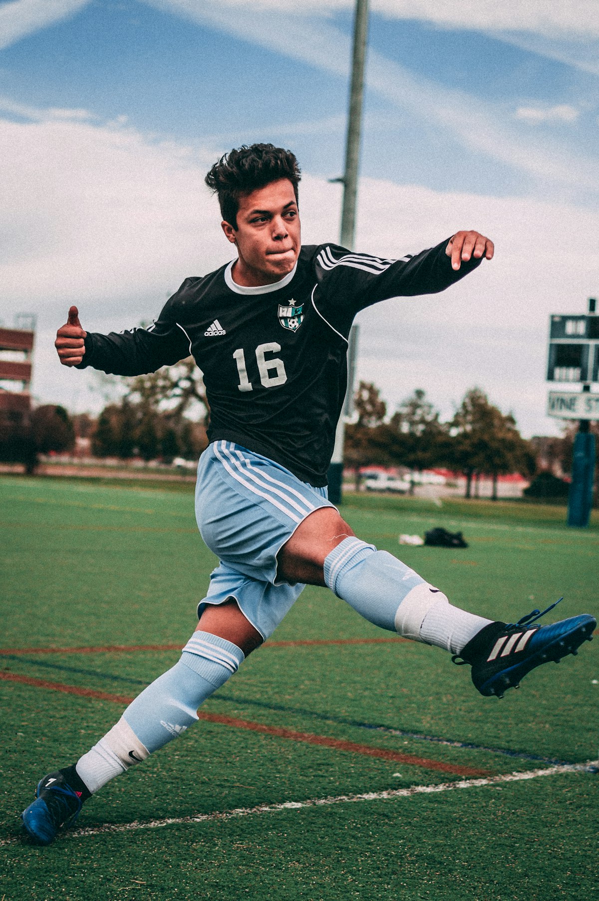 Soccer player striking the ball